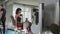 Charming woman working out at hip abductor machine