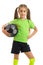 Charming young girl in green shirt with ball in hands