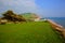 Charmouth Dorset England UK overlooking Lyme Bay with green fields and coast