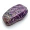 Charoite presenting its intricate purple patterns and swirls, elegantly placed on a white canvas