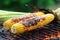 charred corn on the cob on a bamboo mat