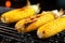 charred corn on the cob on a cooling rack