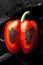 Charred red bell pepper with coals