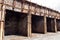 Charred remains of market stalls and metal structures after a fire. burned metallic containers