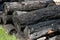 Charred wood logs after a fire