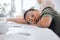 Chasing your dreams is hard work. a young businesswoman sleeping at her desk in an office.