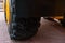 Chassis with wheels for commercial cargo transportation. Traffic safety. A large black rough tire for trucks. Working in a quarry