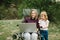 Chat online with family on laptop on picnic in nature. Homeschooling, freelance job. Mom and child. Mother work on Internet with