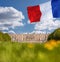 Chateau de Versailles with flag of France in Paris, FRANCE