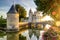 The chateau of Sully-sur-Loire in the sunlight with lens flare,