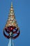 Chatra, or multi-tiered umbrella, an auspicious symbol in Buddhism. Roof of a buddhist temple in Bangkok, Thailand