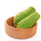 Chayote squash, also known as choko in wooden bowl on white