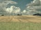 Cheap energy. Wind energy turbines in field with blue sky