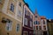 Cheb, Western Bohemia, Czech Republic, 14 August 2021: narrow picturesque street with medieval colorful gothic merchant houses,