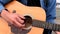Chebeague Island, Maine - 20181007 - Closeup of Hand Strumming Acoustic Guitar.