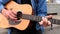 Chebeague Island, Maine - 20181007 - Closeup of Hands Playing Acoustic Guitar.