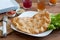 Cheburek - meat pasty on the white plate. Traditional Buryat dish