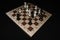 Chechered board under the chessmen for game theme