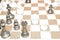 Chechered board with white chessmen for hobby theme