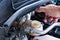 Check brake fluid,Hand open a tank for car maintenance