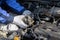 Check engine ignition system and change ignition coil. Car care service..Replacing ignition coil and spark plugs..Car mechanic