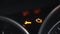 Check engine light symbol that pops up on dashboard when something goes wrong with the engine.