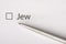 - checkbox with a tick on white paper with metal pen. Checklist concept