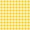 Checked cloth of yellow and gray geometric shapes. Background of colored squares and rectangles on a white background. Yellow fabr