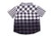 Checked shirts. Close-up of a gray white tartan or plaid shirt for boy isolated on a white background. Childrens summer fashion.