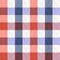 Checked, tartan, plaid or striped seamless pattern in blue, orange and white colors. Vector illustration.