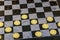 Checkerboard with checkers. Game concept. Board game