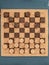 checkerboard game with all pieces of natural cork materials