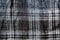 Checkered cloth texture. Squares on textile. Natural fabrics background