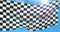Checkered flag, end race background, formula one competition waving on blue sky
