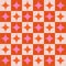 Checkered Pink and orange Mid Century Atomic retro starbursts seamless pattern.