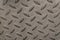 Checkered steel plate. Hot rolled corrugated steel sheet texture.