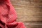 Checkered tablecloth on wood