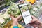 Checking calories on brussels sprout vegetable with smartphone