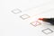 Checklist concept - Red pen check mark on paper checklist box for questionnaire form