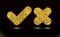 Checkmark and crosshair of texture crumbs, icons. Tick symbol ui element. Gold dust scattering on a black, dark background. Design