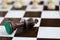 Checkmate. Black king is Playing chess. Black an white Chess pieces. Moving the pieces in chess game. Beautiful chess. Stock photo