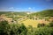 Cheddar Gorge landscape view: cliffs and a town