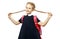 Cheerful 8 years old schoolgirl with backpack wearing uniform standing isolated over white background. Ready for school