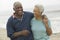 Cheerful African American Mature Couple At Beach