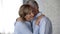 Cheerful aged lady and man hugging, harmonious marriage, reliable relations