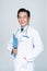 Cheerful Asian physician