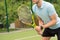 Cheerful athlete waiting for tennis ball