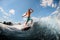 Cheerful athletic guy actively ride on the waves on surfboard against blue sky