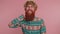 Cheerful bearded hippie hipster redhead man fashion model in pattern shirt smiling looking at camera