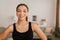 Cheerful Black Fitness Lady Posing Wearing Fitwear At Home